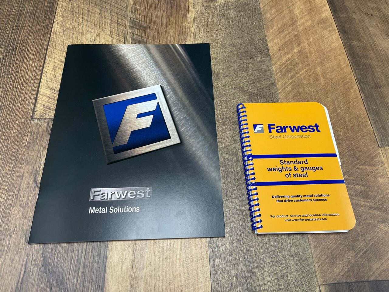 Example of Morel's printing capabilities, showing a branded sales folder and notebook