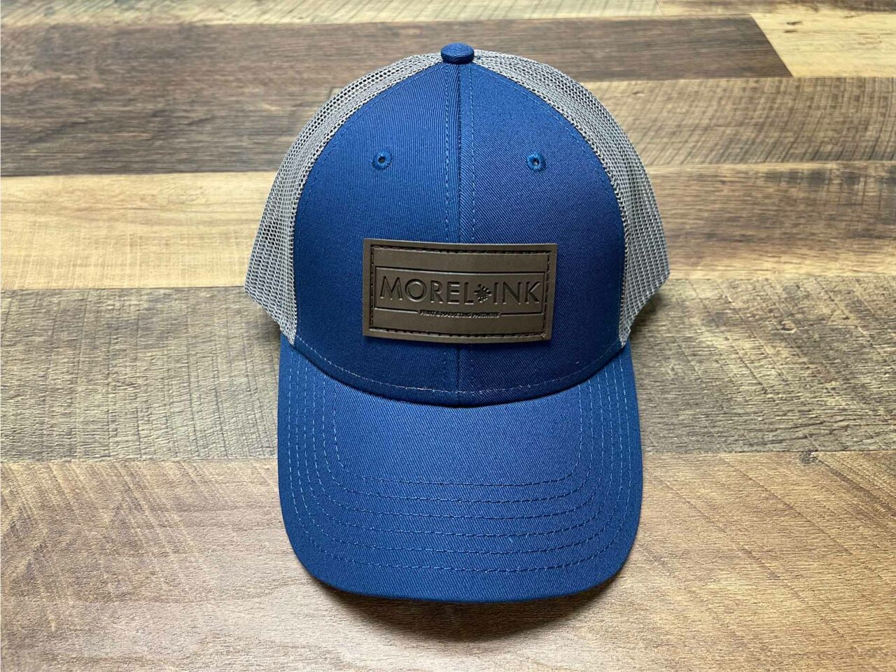 Example of Morel's apparel capabilities, showing a custom branded hat