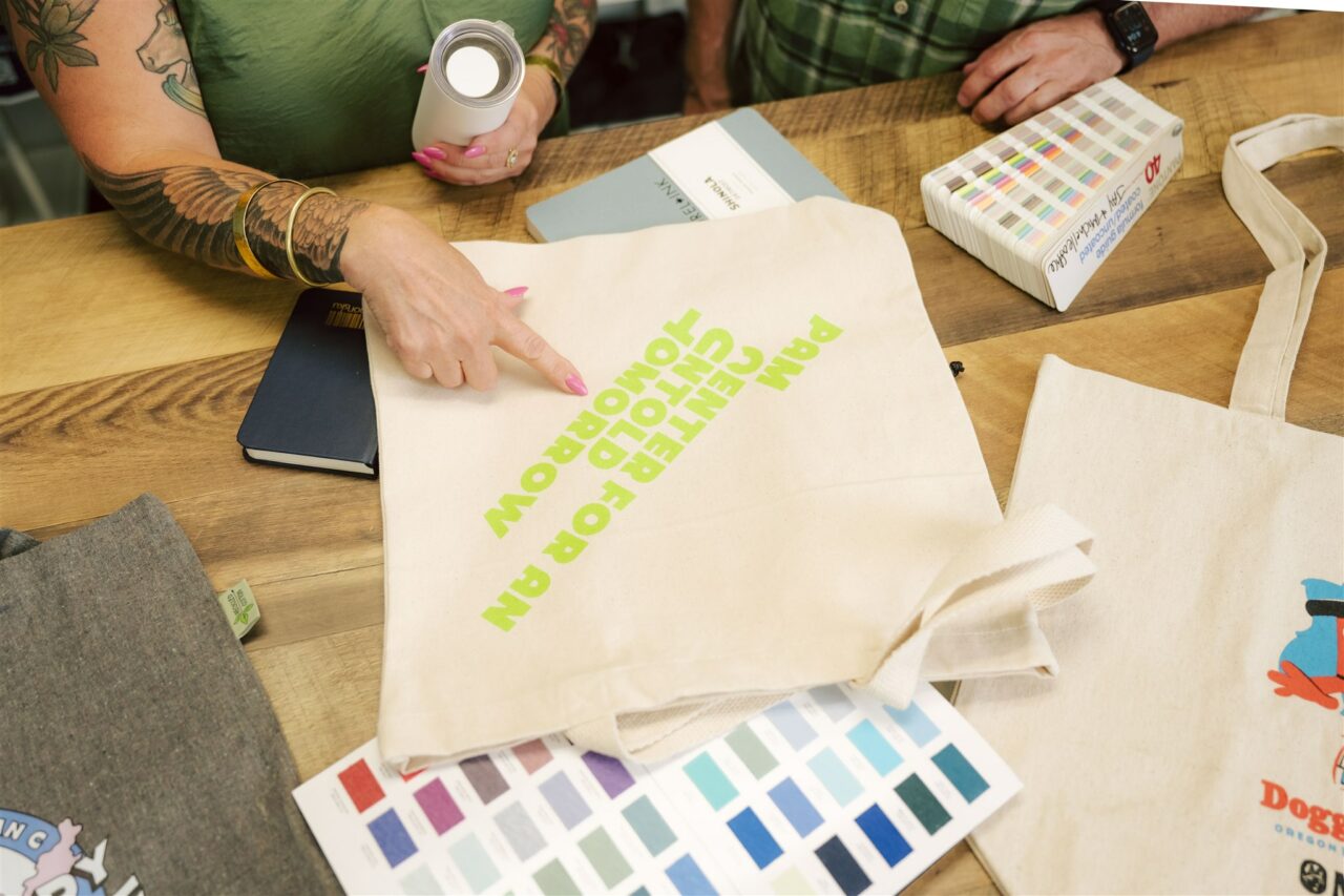 A close-up of Morel's promotional capabilities with a custom branded totebag